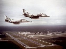 Home Comforts Laminated Poster Two U.s. Navy Douglas TA-4F Skyhawk From Attack Squadron 45 Blackbirds In Flight.