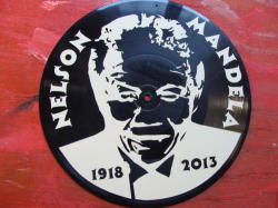 25cm Lp Record Featuring The Face Of Nelson Mandela In White Vinyl